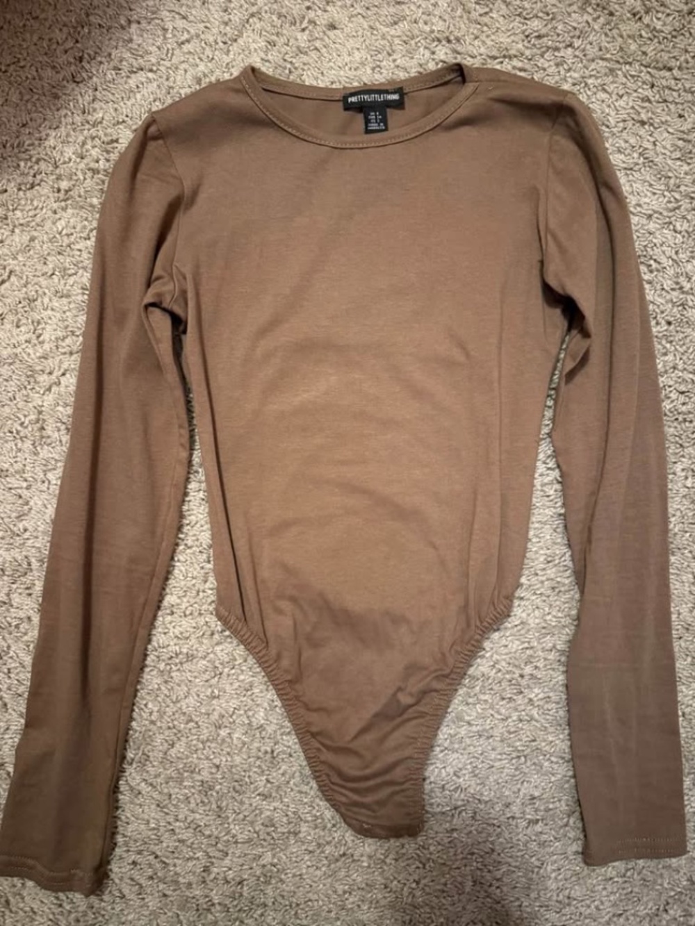 Like new PrettyLittleThing long-sleeved brown body suit, size 2